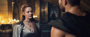 Movie still from “I, Frankenstein” (2014), directed by Stuart Beattie – A woman with long red hair standing next to a man; Close Up shot, Over the shoulder angle
