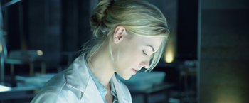 Movie still from “I, Frankenstein” (2014), directed by Stuart Beattie – A woman with blonde hair wearing a white lab coat; Close Up shot, Low angle