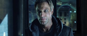 Movie still from “I, Frankenstein” (2014), directed by Stuart Beattie – A person wearing a black jacket; Close Up shot, Low angle