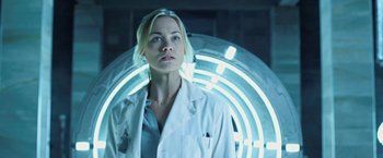 Movie still from “I, Frankenstein” (2014), directed by Stuart Beattie – A woman wearing a lab coat standing in front of a wall; Close Up shot, Low angle