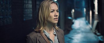 Movie still from “I, Frankenstein” (2014), directed by Stuart Beattie – A woman with long blonde hair wearing a brown jacket; Close Up shot, Over the shoulder angle