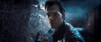 Movie still from “I, Frankenstein” (2014), directed by Stuart Beattie – A person wearing a leather jacket; Close Up shot, Over the shoulder angle