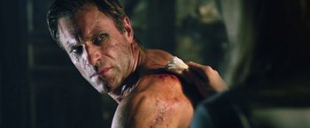 Movie still from “I, Frankenstein” (2014), directed by Stuart Beattie – A person shaving his chest; Close Up shot, Over the shoulder angle