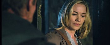 Movie still from “I, Frankenstein” (2014), directed by Stuart Beattie – A person wearing a brown jacket; Close Up shot, Over the shoulder angle