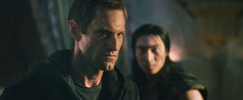 Movie still from “I, Frankenstein” (2014), directed by Stuart Beattie – A man and a woman are looking at the camera; Close Up shot, Low angle