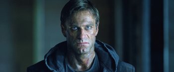 Movie still from “I, Frankenstein” (2014), directed by Stuart Beattie – A person wearing a black shirt; Close Up shot, Low angle