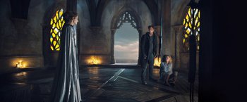Movie still from “I, Frankenstein” (2014), directed by Stuart Beattie – A group of people standing in a room with arches; Wide shot, High angle