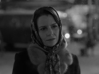 Movie still from “Ida” (2013), directed by Pawel Pawlikowski – A black and white photo of a woman wearing a scarf; Close Up shot, Low angle