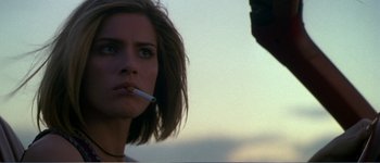 Movie still from “Identity” (2003), directed by James Mangold – A person smoking a cigarette; Close Up shot, Low angle