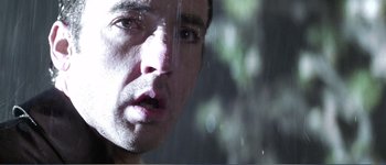 Movie still from “Identity” (2003), directed by James Mangold – A man's face in front of a window; Extreme Close Up shot, Low angle
