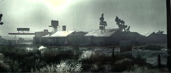 Movie still from “Identity” (2003), directed by James Mangold – An abandoned building in the middle of a field; Extreme Wide shot, High angle