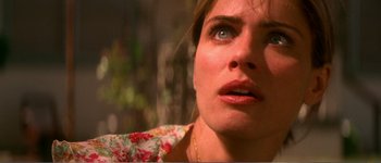 Movie still from “Identity” (2003), directed by James Mangold – A woman's face looking up at the sky; Close Up shot, Low angle