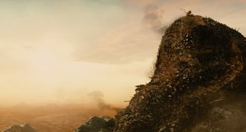 Movie still from “Idiocracy” (2006), directed by Mike Judge – A large pile of garbage on top of a hill; Extreme Wide shot, Low angle