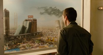 Movie still from “Idiocracy” (2006), directed by Mike Judge – A man looking out a window at a city; Extreme Wide shot, Over the shoulder angle