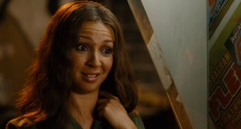 Movie still from “Idiocracy” (2006), directed by Mike Judge – A person holding a umbrella; Close Up shot, High angle