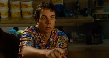 Movie still from “Idiocracy” (2006), directed by Mike Judge – A man with a surprised look on his face; Close Up shot, Over the shoulder angle
