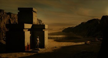 Movie still from “Immortals” (2011), directed by Tarsem Singh – An image of an alien in a desert setting; Extreme Wide shot, High angle