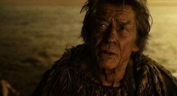 Movie still from “Immortals” (2011), directed by Tarsem Singh – An old man with a very long hair; Close Up shot, Over the shoulder angle