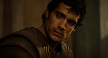 Movie still from “Immortals” (2011), directed by Tarsem Singh – A person with a beard; Close Up shot, Over the shoulder angle
