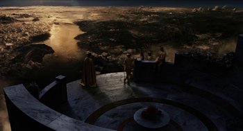 Movie still from “Immortals” (2011), directed by Tarsem Singh – A group of people sitting on top of a building; Extreme Wide shot, High angle