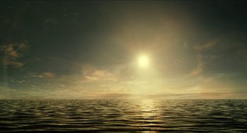 Movie still from “Immortals” (2011), directed by Tarsem Singh – The sun is setting over a body of water; Extreme Wide shot, High angle