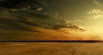 Movie still from “Immortals” (2011), directed by Tarsem Singh – The sky is lit up by the setting sun; Extreme Wide shot, Low angle
