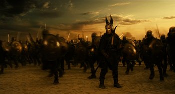 Movie still from “Immortals” (2011), directed by Tarsem Singh – A lot of people that are dressed up in costumes; Wide shot, High angle