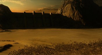 Movie still from “Immortals” (2011), directed by Tarsem Singh – A view of a large body of water near a mountain; Extreme Wide shot, High angle