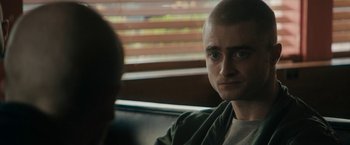 Movie still from “Imperium” (2016), directed by Daniel Ragussis – A person sitting in a chair; Close Up shot, Over the shoulder angle