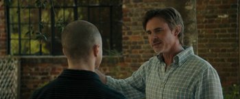 Movie still from “Imperium” (2016), directed by Daniel Ragussis – A man is talking to a young man; Close Up shot, Over the shoulder angle
