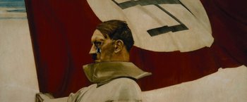 Movie still from “Imperium” (2016), directed by Daniel Ragussis – A painting of adolf hitler wearing a neck brace; Extreme Close Up shot, Low angle
