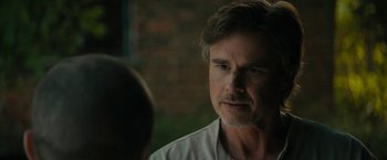 Movie still from “Imperium” (2016), directed by Daniel Ragussis – A person looking at the camera; Close Up shot, Over the shoulder angle
