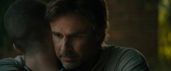 Movie still from “Imperium” (2016), directed by Daniel Ragussis – A person with long hair; Close Up shot, Low angle