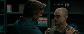 Movie still from “Imperium” (2016), directed by Daniel Ragussis – Two men are looking at each other in a room; Close Up shot, Over the shoulder angle