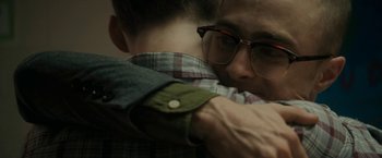 Movie still from “Imperium” (2016), directed by Daniel Ragussis – A man hugging another man with his arm around another man; Close Up shot, Over the shoulder angle