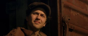 Movie still from “In Dubious Battle” (2016), directed by James Franco – A person wearing a hat; Close Up shot, Low angle