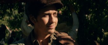 Movie still from “In Dubious Battle” (2016), directed by James Franco – A person wearing a hat; Close Up shot, Over the shoulder angle