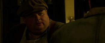 Movie still from “In Dubious Battle” (2016), directed by James Franco – A person wearing a hat; Close Up shot, Low angle