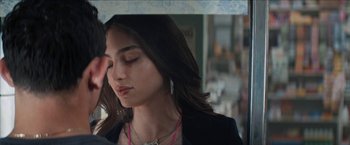 A person with her eyes closed