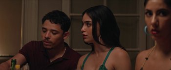 Movie still from “In the Heights” (2021), directed by Jon M. Chu – A man and a woman standing next to each other; Close Up shot, Over the shoulder angle