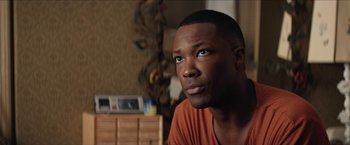 Movie still from “In the Heights” (2021), directed by Jon M. Chu – A person looking at the camera; Close Up shot, Over the shoulder angle