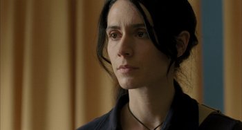 Movie still from “Incendies” (2010), directed by Denis Villeneuve – A person wearing a black shirt; Close Up shot, Low angle