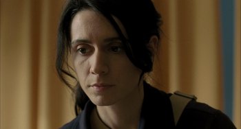 Movie still from “Incendies” (2010), directed by Denis Villeneuve – A person with long black hair; Close Up shot, Low angle