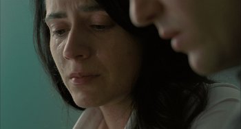 Movie still from “Incendies” (2010), directed by Denis Villeneuve – A person with a tear in her eye; Extreme Close Up shot, Low angle