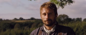 Movie still from “Far from the Madding Crowd” (2015), directed by Thomas Vinterberg – A person with a beard; Close Up shot, Low angle