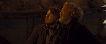 Movie still from “Far from the Madding Crowd” (2015), directed by Thomas Vinterberg – A man and a man sitting next to each other; Close Up shot, Low angle