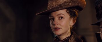 Movie still from “Far from the Madding Crowd” (2015), directed by Thomas Vinterberg – A person wearing a hat; Close Up shot, Low angle