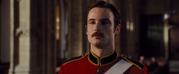 Movie still from “Far from the Madding Crowd” (2015), directed by Thomas Vinterberg – A person wearing a uniform; Close Up shot, Low angle