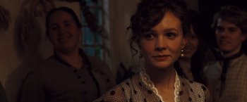 Movie still from “Far from the Madding Crowd” (2015), directed by Thomas Vinterberg – A woman standing next to another woman in front of a window; Close Up shot, Over the shoulder angle