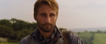 Movie still from “Far from the Madding Crowd” (2015), directed by Thomas Vinterberg – A person with a beard; Close Up shot, Over the shoulder angle